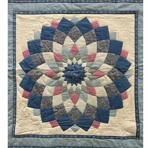 Elegant Blue and Cream Patchwork Quilt